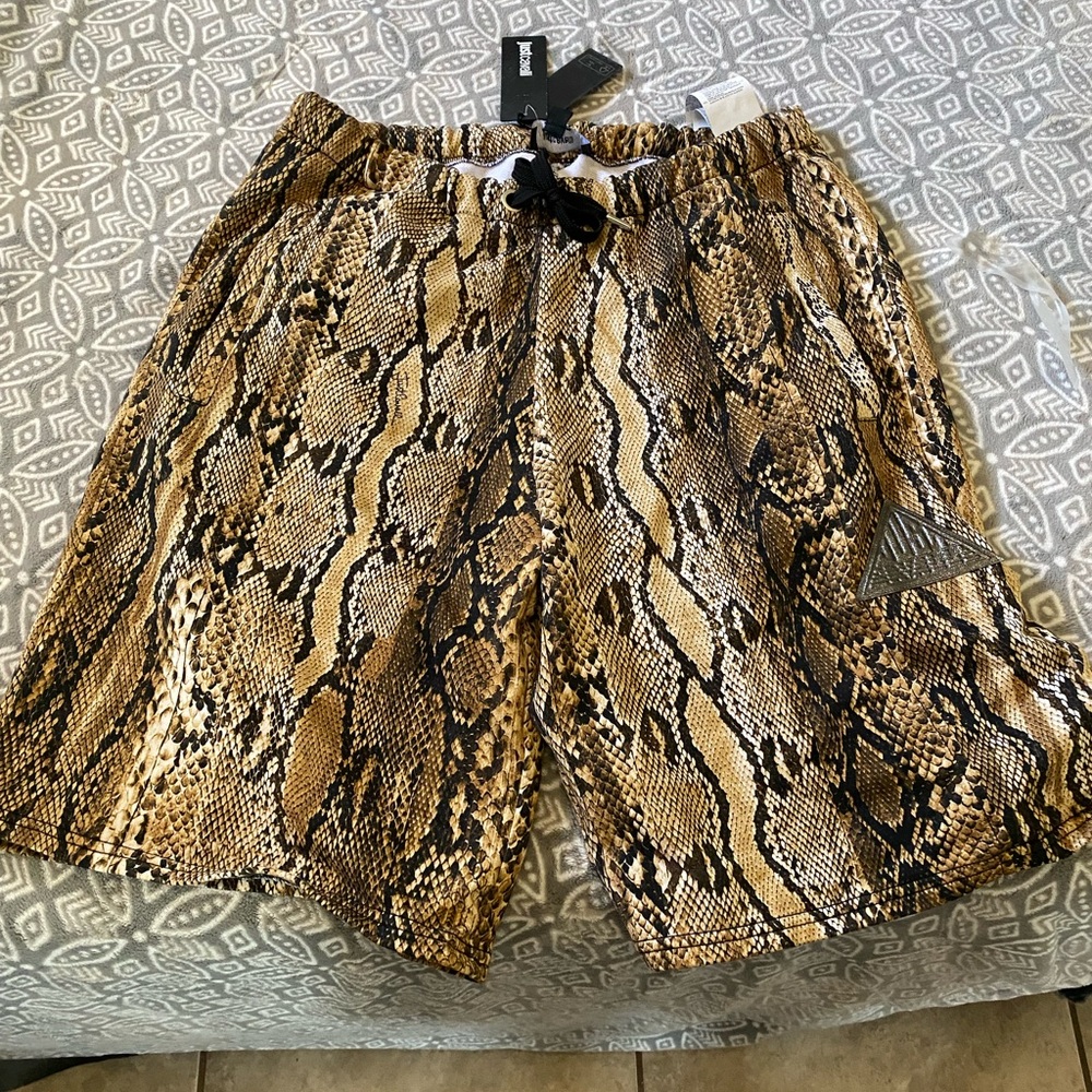 Bran new Mens Just Cavalli shorts. Size medium.